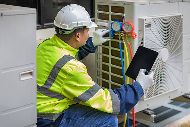 Professional Air Conditioning Repair technician working in Freeport, TX